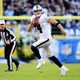 Derek Carr, still doing that thing with his tongue in a game last December. Photo: Harry How/Getty Images